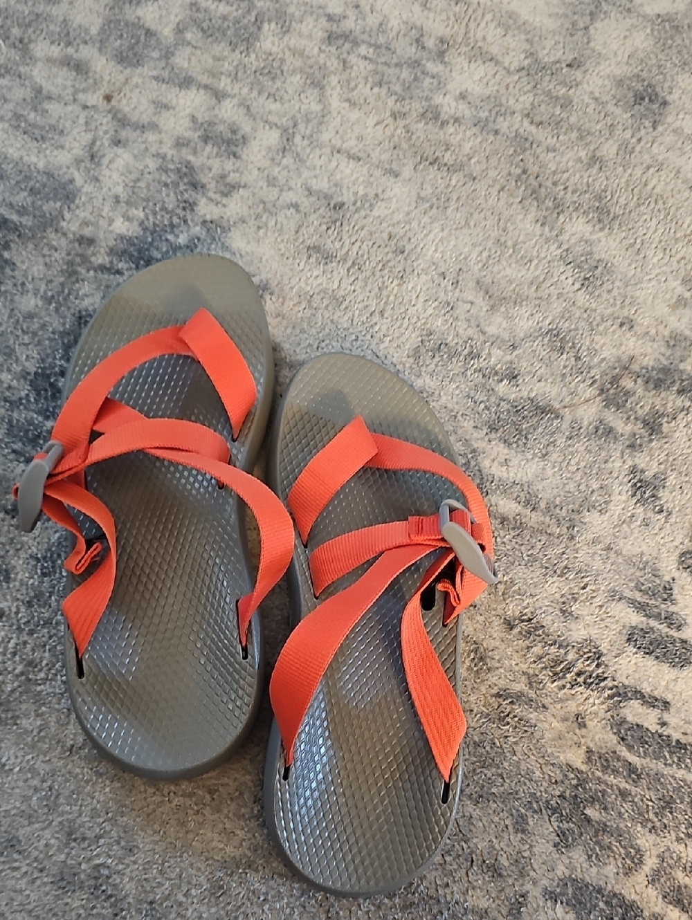 Chaco Tegu Slip-on Hiking Sandals in a Solid Orange Color